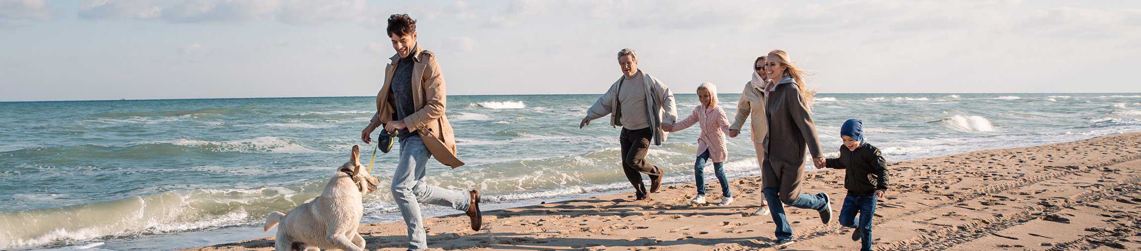 People running on a beach